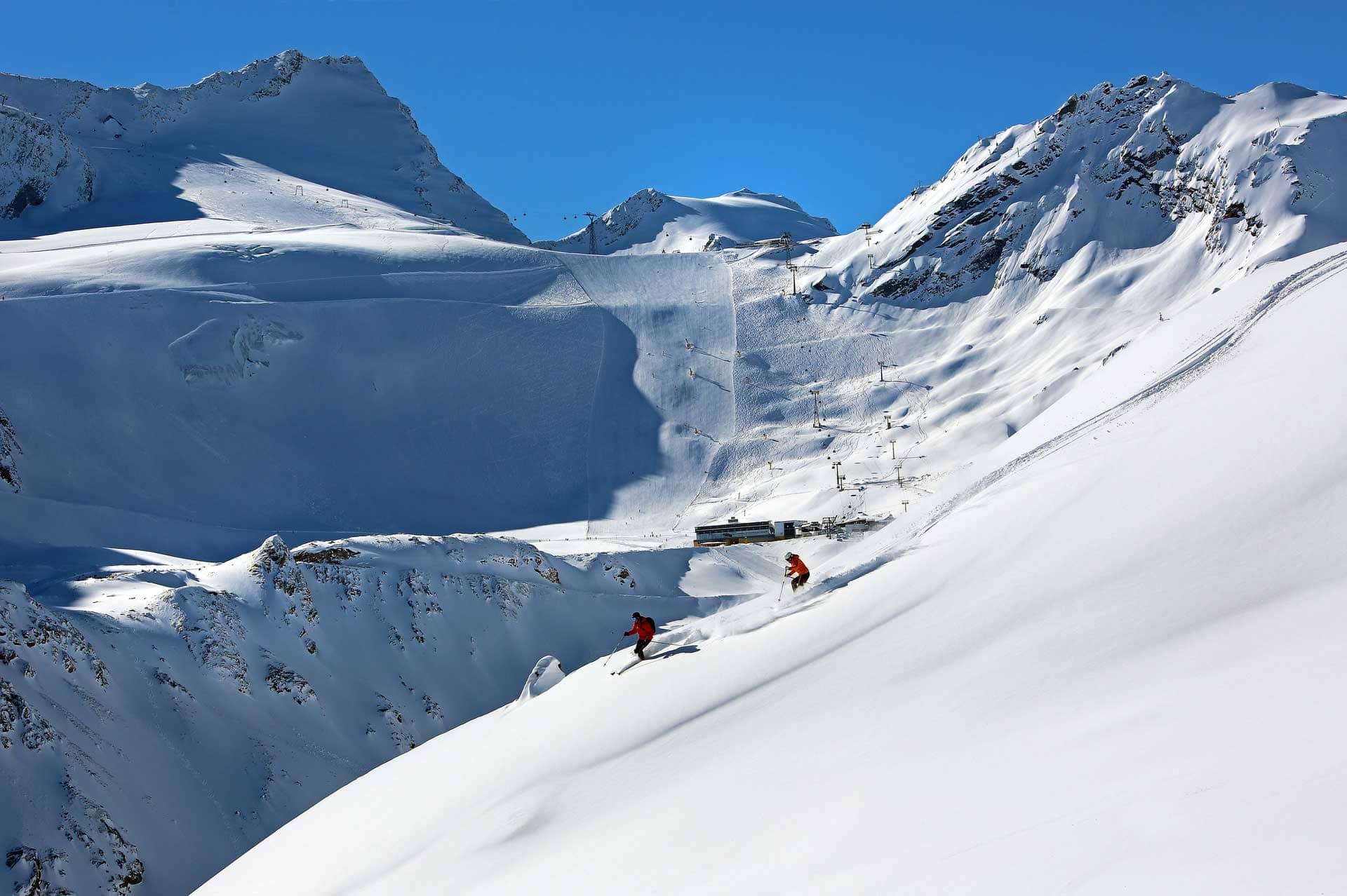 Mountain panorama with skiers